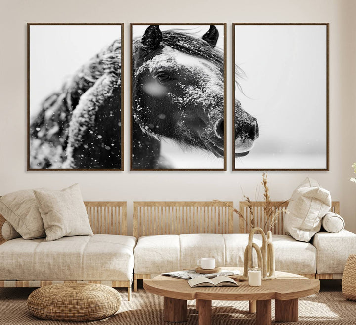 A large 3-panel rustic farmhouse wall art showcases a black and white winter horse canvas print against a snowy backdrop.