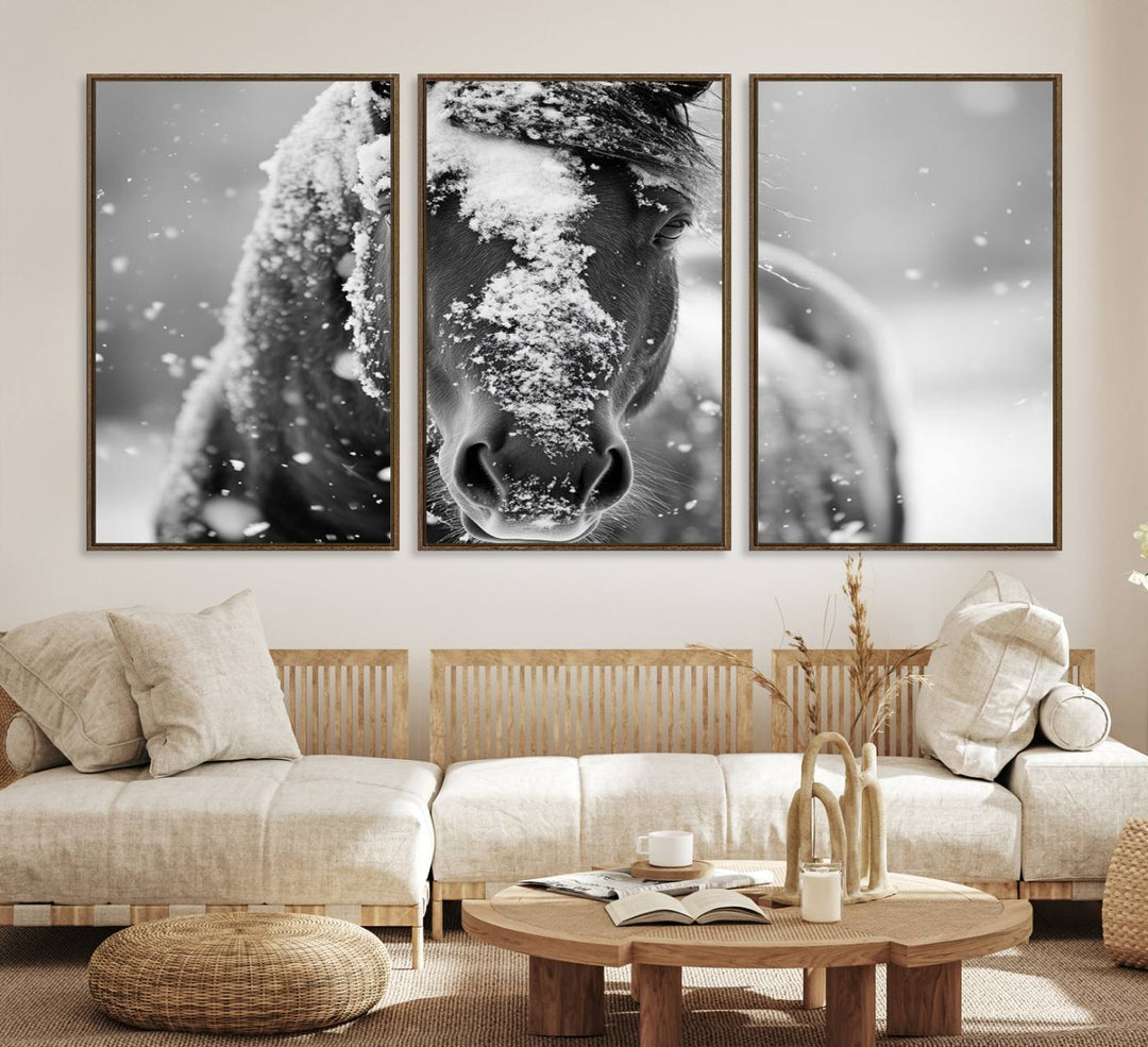 The Black and White Horse Winter Wall Art features a majestic horse with snow-covered hair set against a serene winter backdrop.