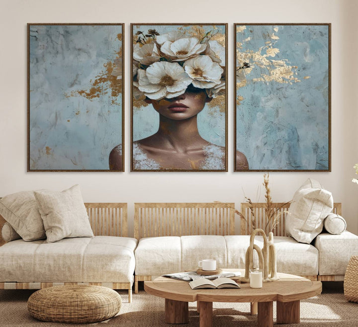 Golden Petal Wall Art: A womans face adorned with a gold floral design on a teal background, presented in a 3-panel modern glam canvas.