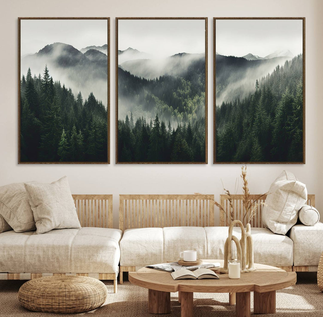 The Misty Forest Canvas Print Wall Art captures a serene misty forest scene with fog and mountains.