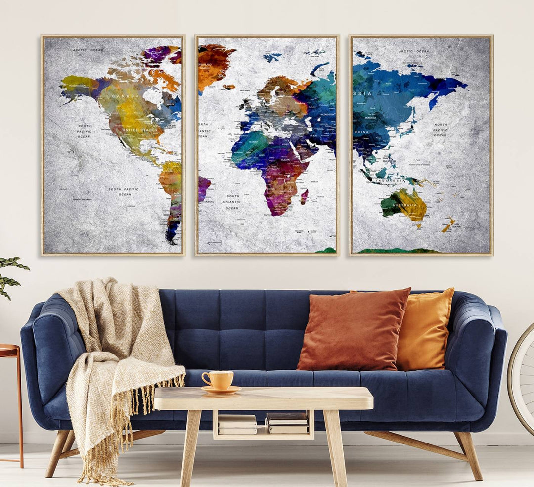 The World Map Art Canvas Print, featuring country names on a grunge-stained gray background, is perfect for stylish home decor.