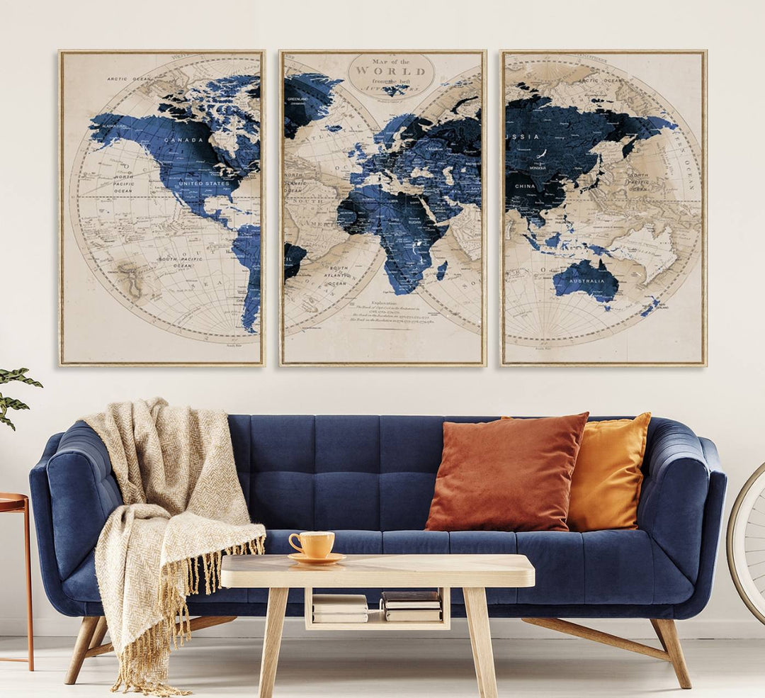 The Vintage Triptych Map Print is a grunge-stained blue and beige world map, perfect for enhancing wall decor.