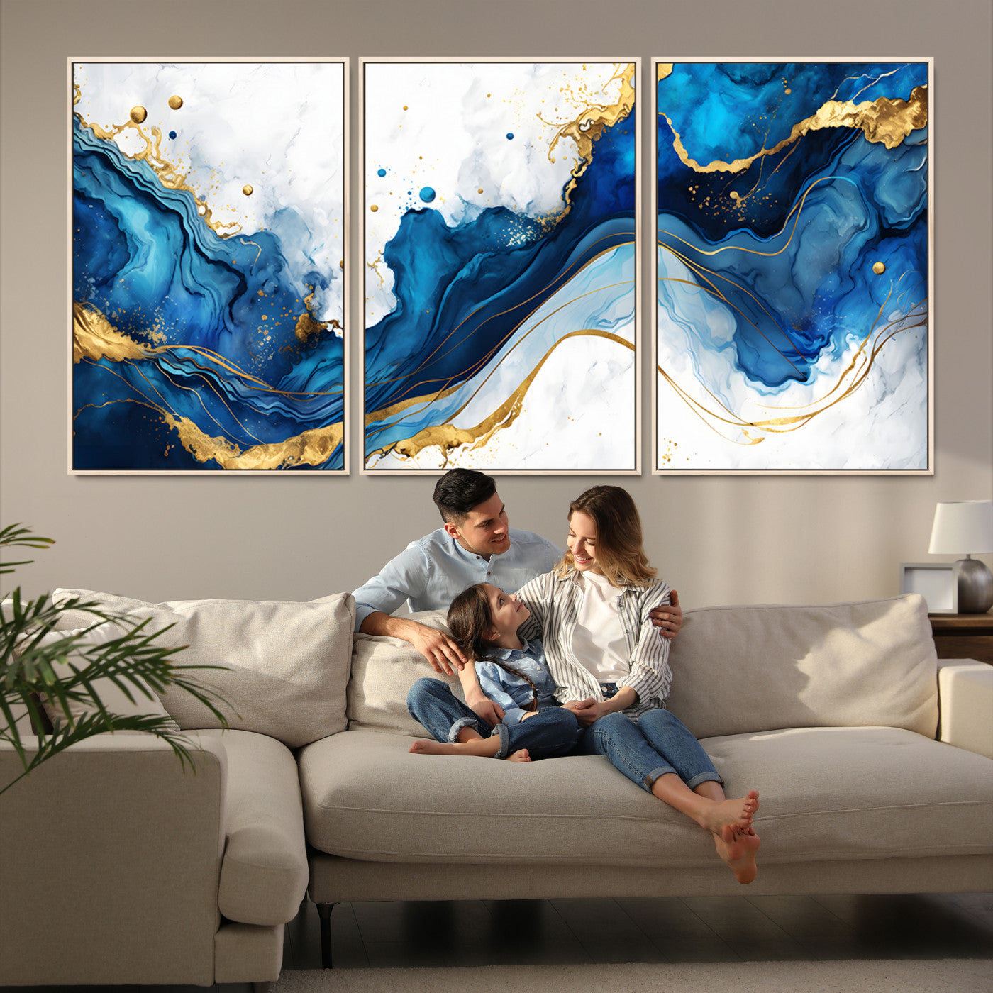 Elegant abstract canvas in cobalt blue and gold tones, featuring marble waves and fluid motion, ideal for luxe interior styling.