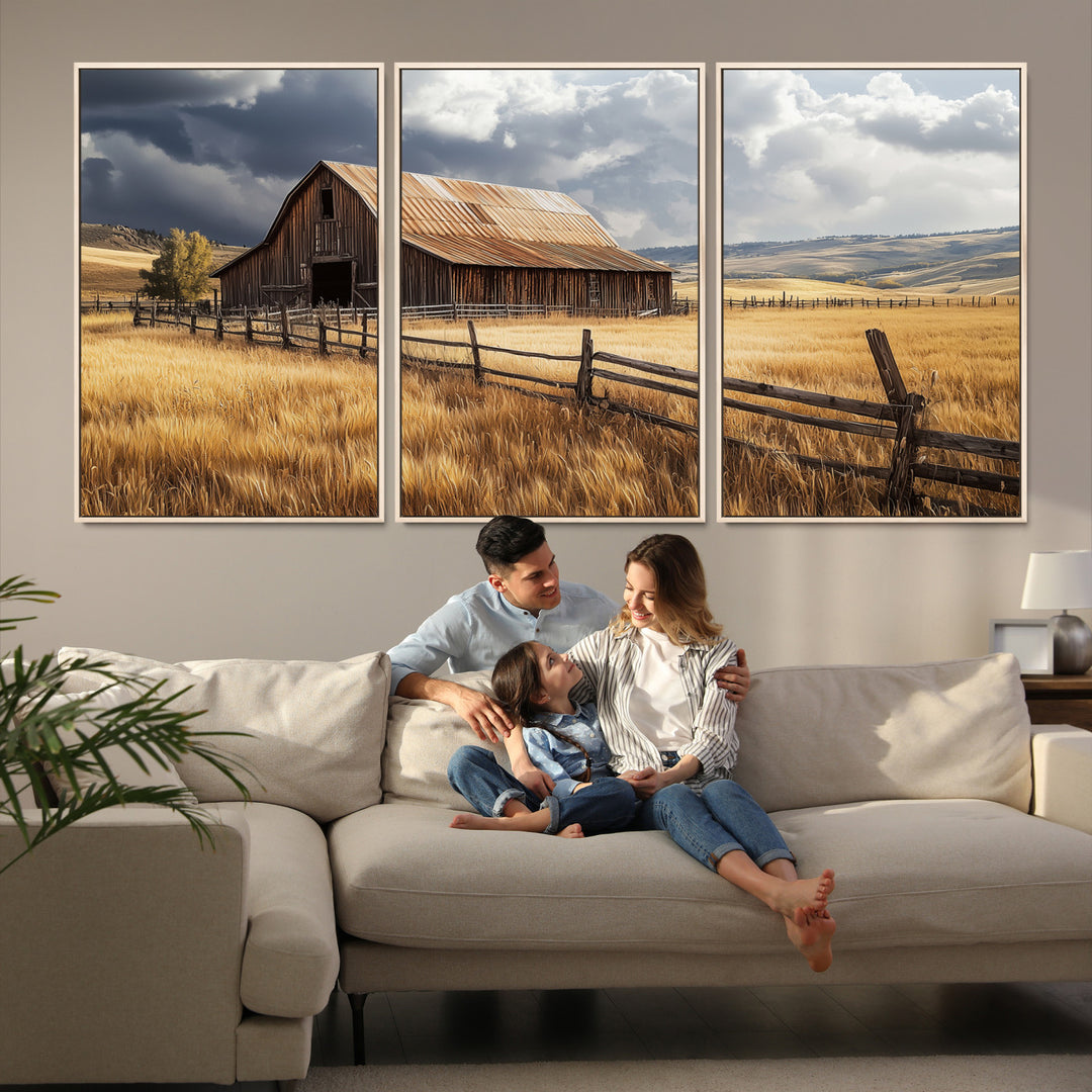 Canvas of a weathered wooden barn in a golden field under a dramatic sky, perfect for rustic or farmhouse-style wall decor.