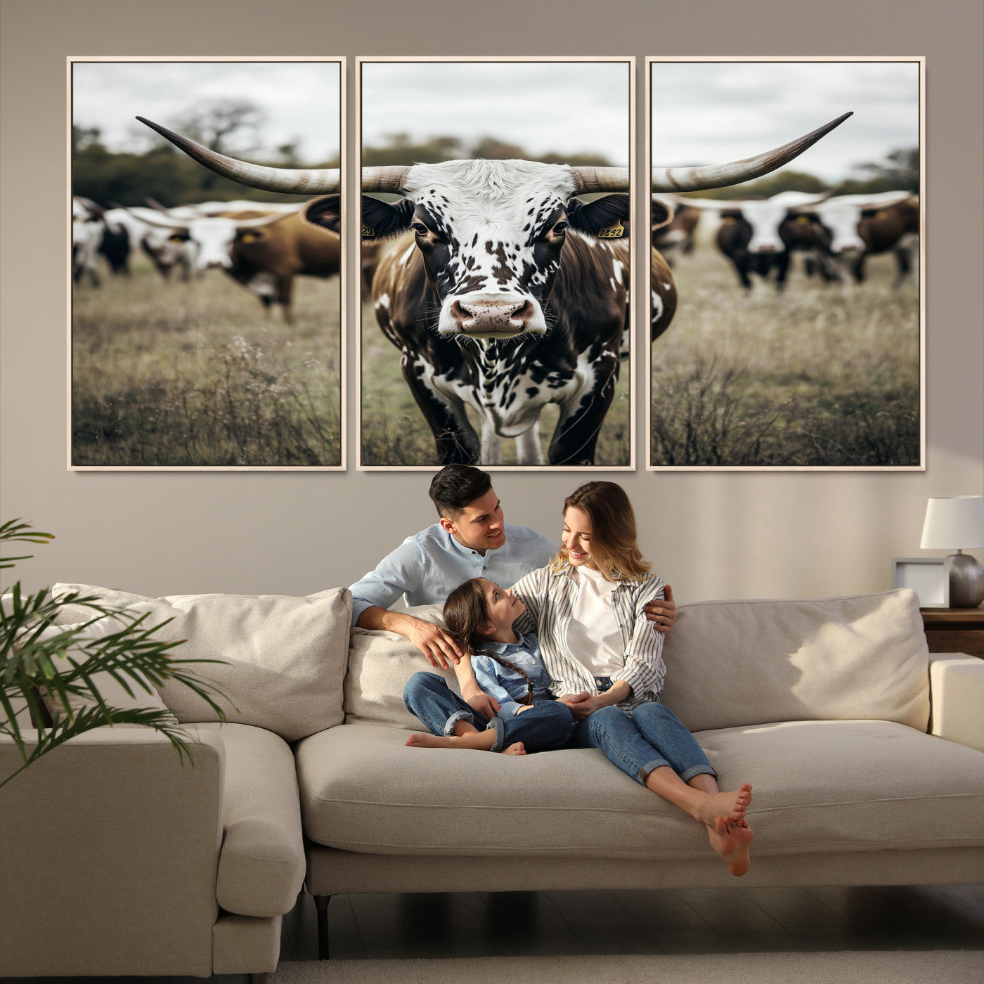 Canvas of a speckled Texas longhorn standing boldly in a field with a herd behind, perfect for rustic western or farmhouse wall decor.