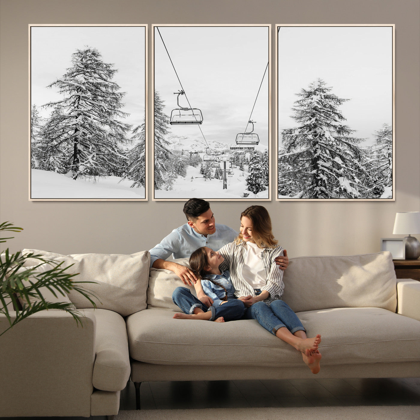Black and white image of a ski lift amidst snow-covered pine trees, ideal for winter mountain or cabin-themed decor.
