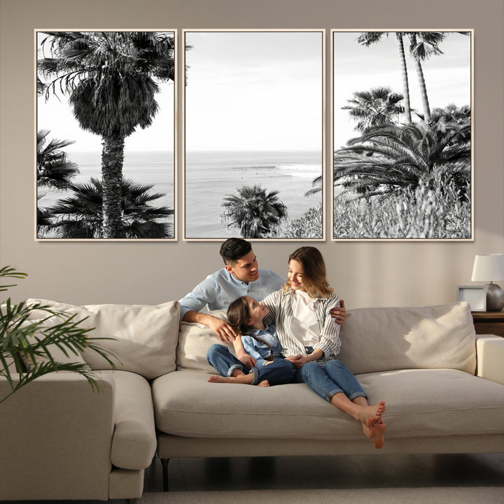 Monochrome canvas of palm trees framing a coastal surf scene, perfect for California-inspired or retro black-and-white beach decor.