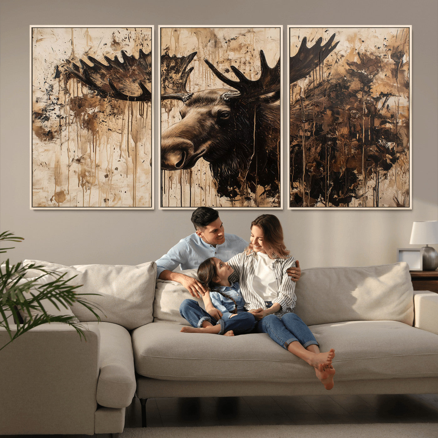 Artistic painting of a moose head with large antlers in shades of brown and black, with paint splatters and drips on a beige textured background, creating a rustic and expressive wall art canvas.