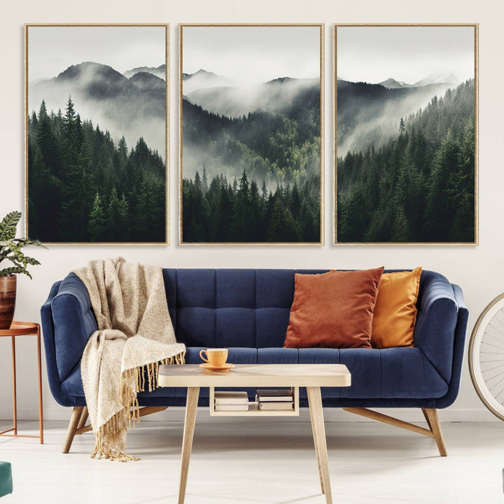 The Misty Forest Canvas Print Wall Art captures a serene misty forest scene with fog and mountains.