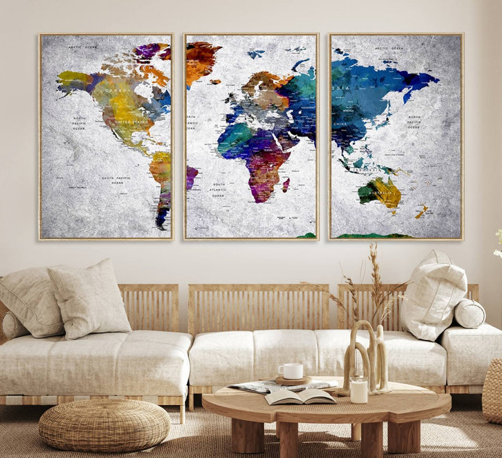 The World Map Art Canvas Print, featuring country names on a grunge-stained gray background, is perfect for stylish home decor.