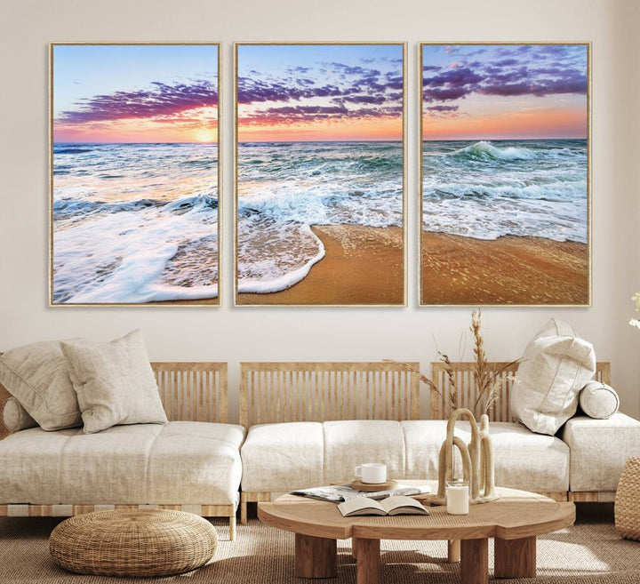 The Coastal Sunset Art Canvas Print features ocean waves beneath a vibrant sky in a stunning 3-panel seascape.