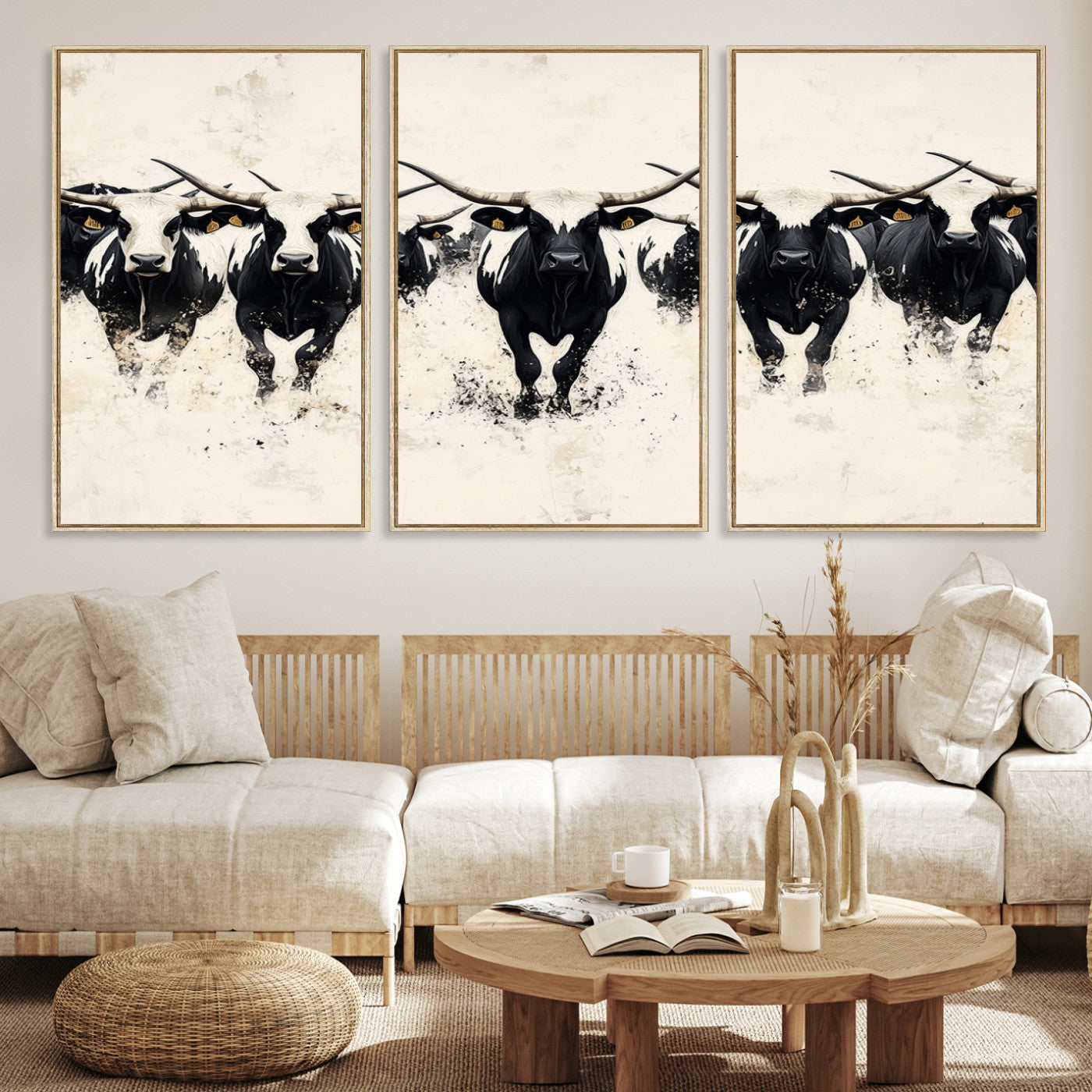 Canvas artwork of black and white Texas longhorns in a bold stampede over a minimalist background, ideal for rustic modern or Western-themed decor.