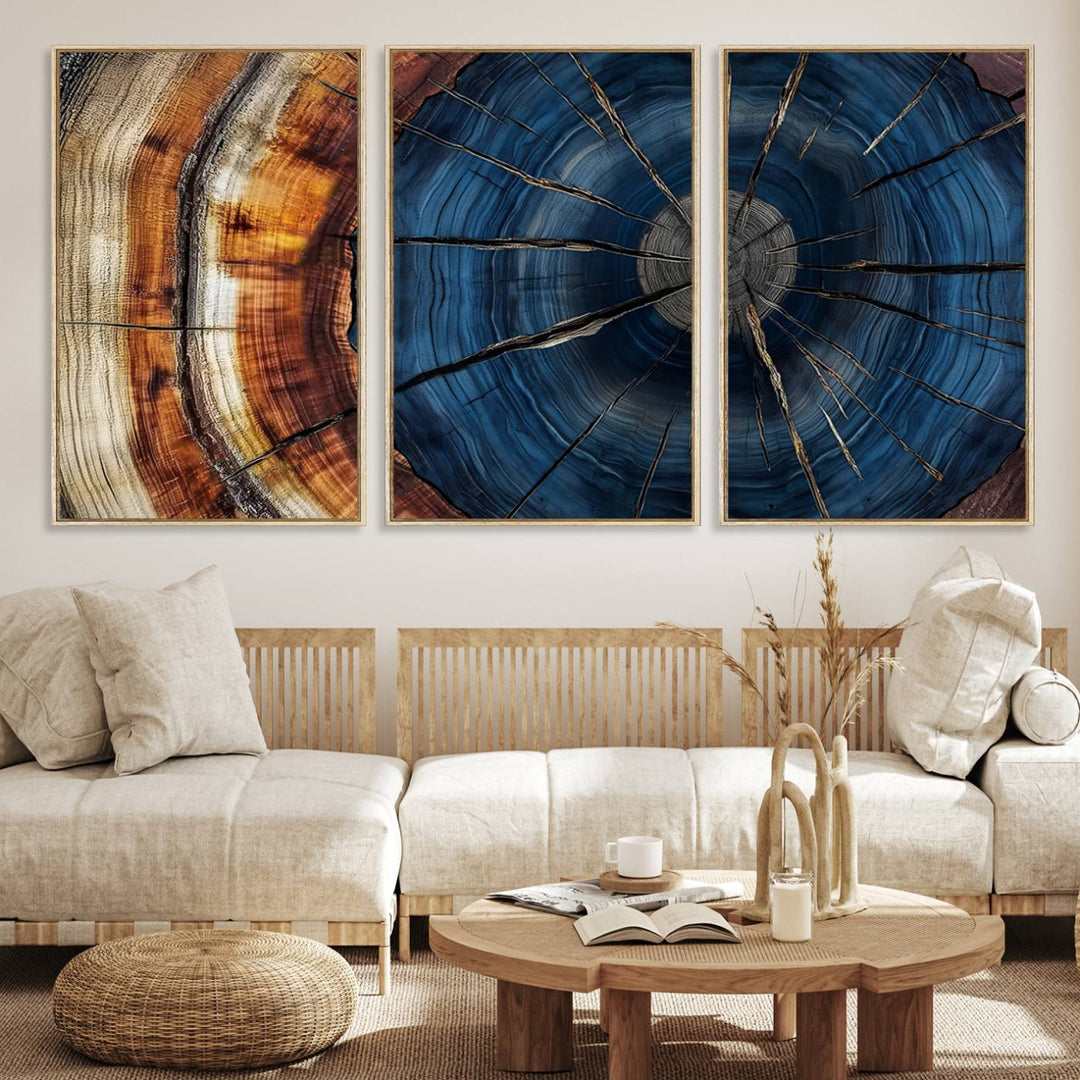 The Abstract Tree Rings Canvas Print features blue, brown, and orange rings that highlight wood grain and natures beauty.