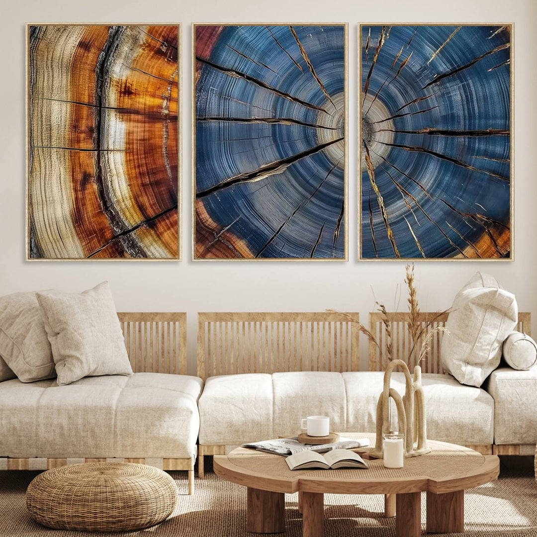 Close-up of blue, brown, and orange wood grain rings on the Abstract Tree Rings Canvas Wall Art Print.