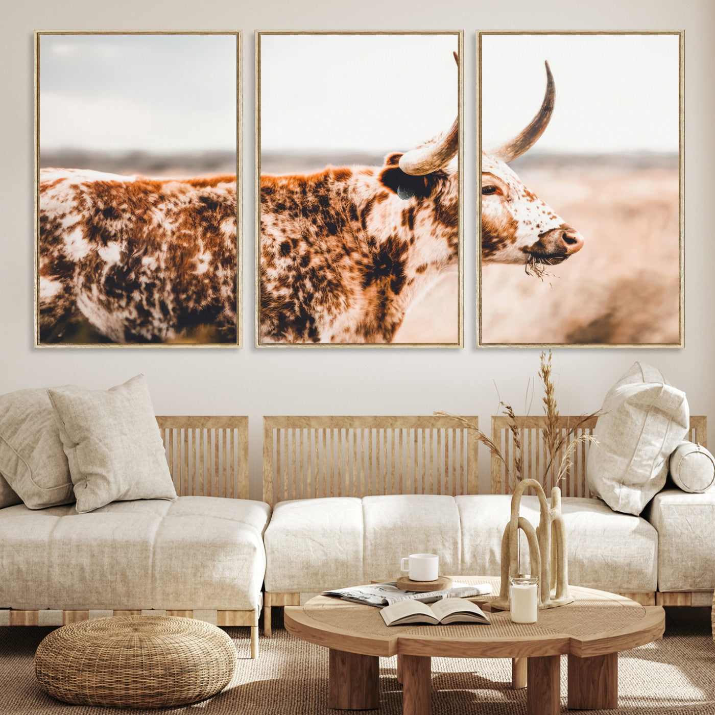 Speckled Texas longhorn with curved horns standing in a warm-toned prairie, perfect for rustic or country-style home decor.
