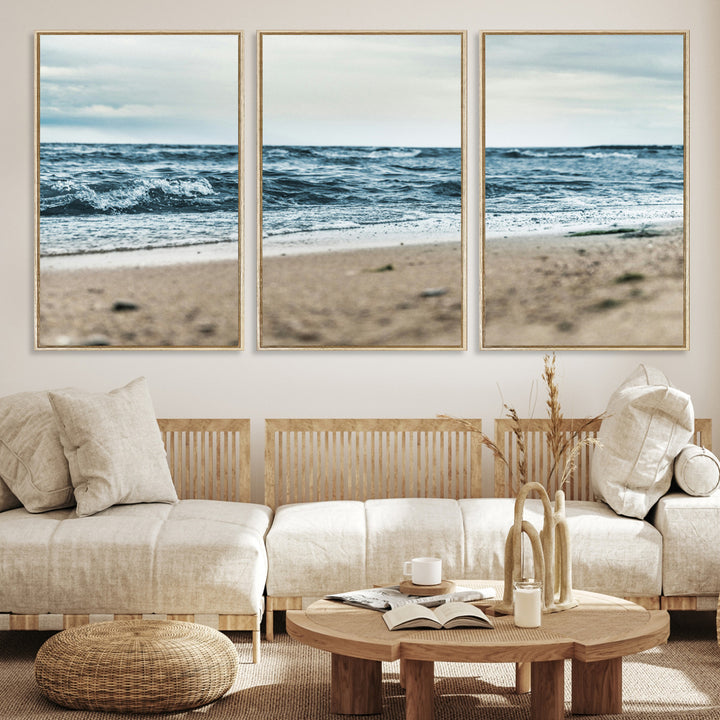A moody ocean scene with gentle waves washing onto a sandy beach under a cloudy sky, creating a peaceful and coastal atmosphere.