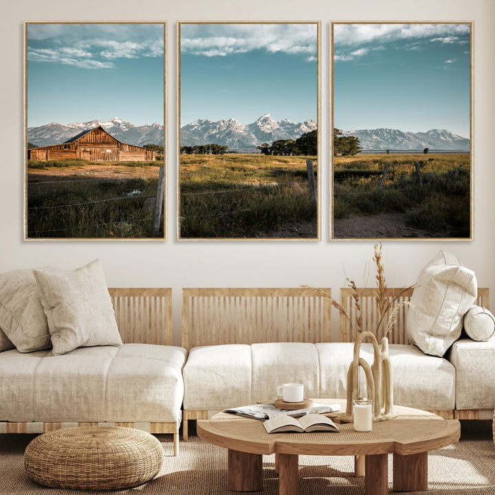 A rustic farmhouse with a wooden barn set against majestic mountain peaks under a soft blue sky, evoking peaceful countryside charm.