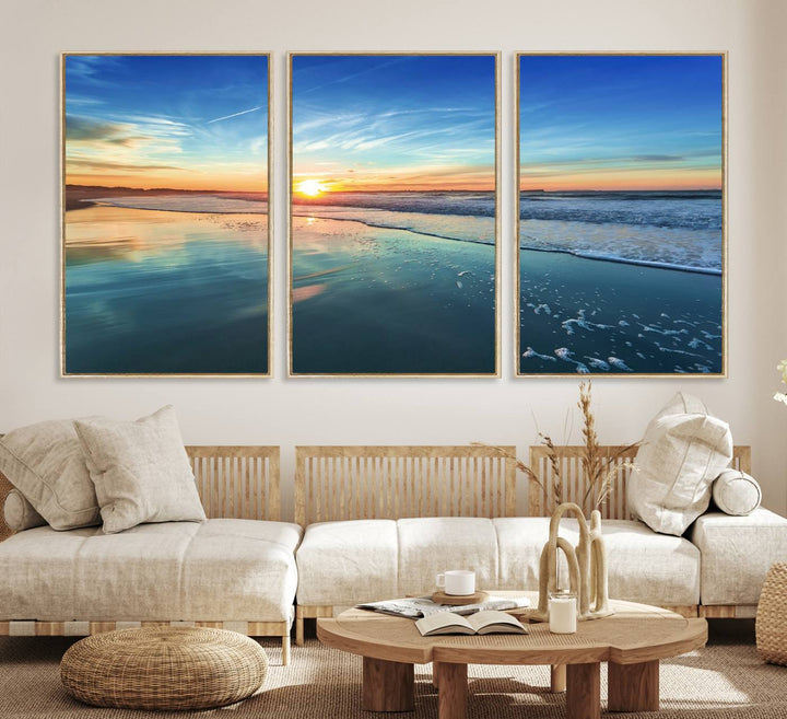 The Blue Sky and Beach Wall Art Canvas Print features a vibrant orange sky reflecting on wet sand.