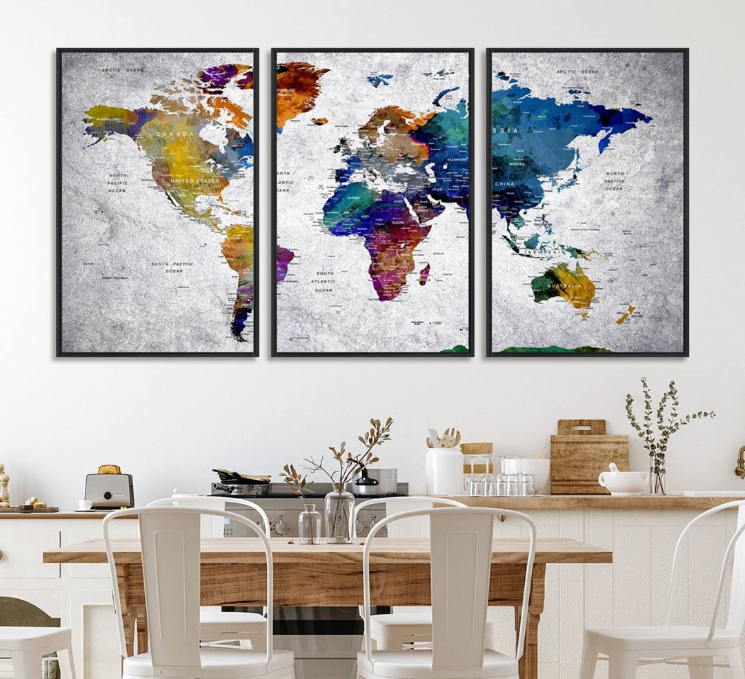 The World Map Art Canvas Print, featuring country names on a grunge-stained gray background, is perfect for stylish home decor.