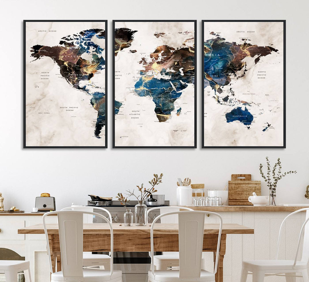 Abstract earth-toned 3-panel world map wall art featuring blues and browns, ready to hang; it showcases continents on modern canvas.