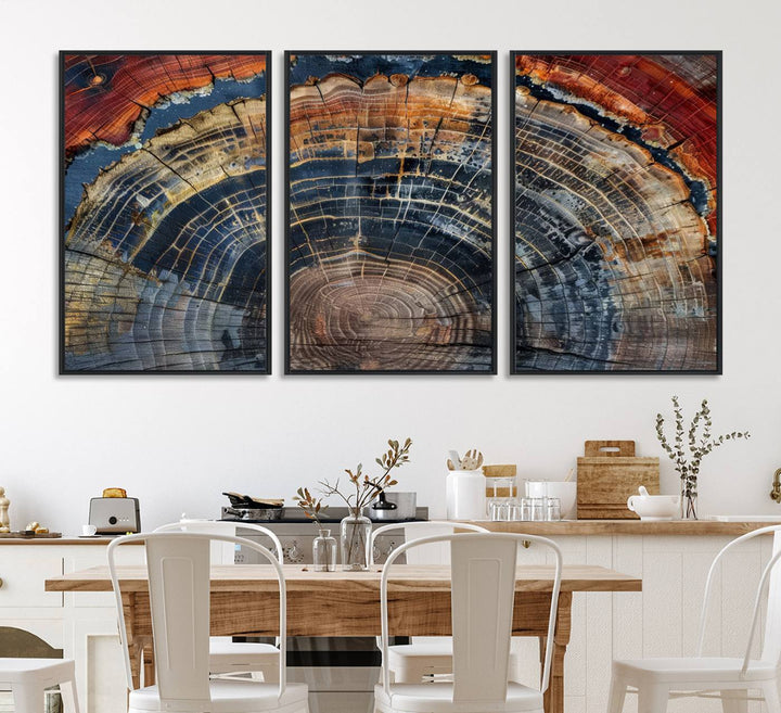 The Abstract Tree Ring Wall Art in orange, blue, and gray perfectly complements minimalist nature-inspired home decor.