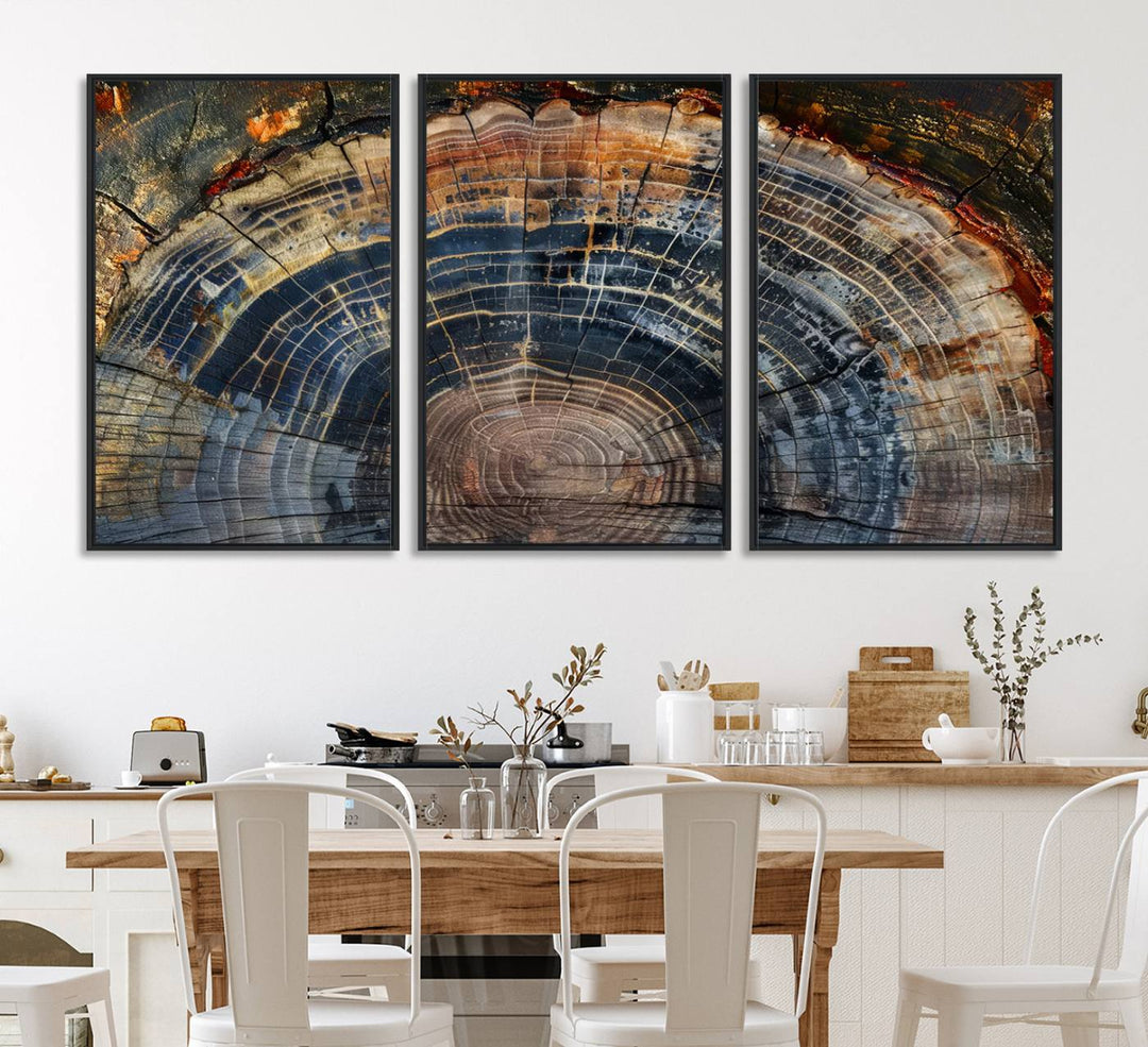 The abstract wall art showcases colorful tree rings in shades of brown, blue, and orange on a minimalist canvas.