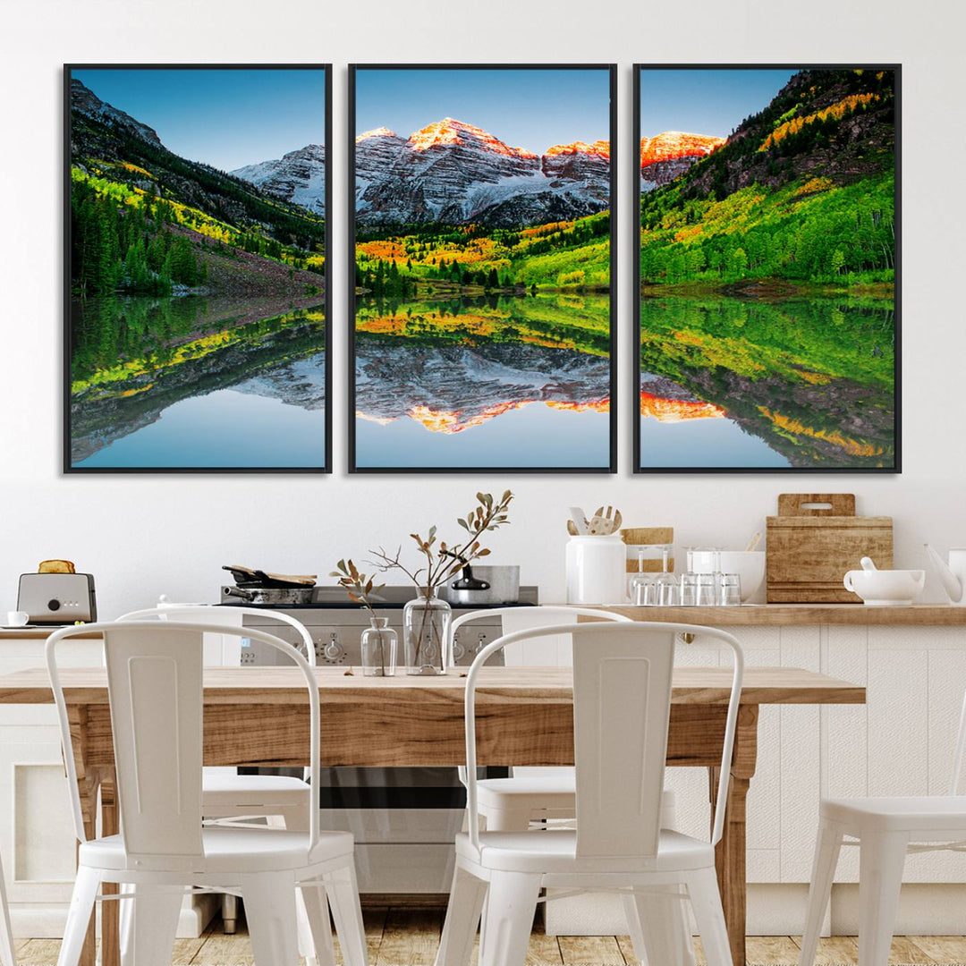 The Sunrise Maroon Bells Lake Wall Art Print beautifully captures North Maroon Peak mirrored in the tranquil lake, framed by lush greenery.