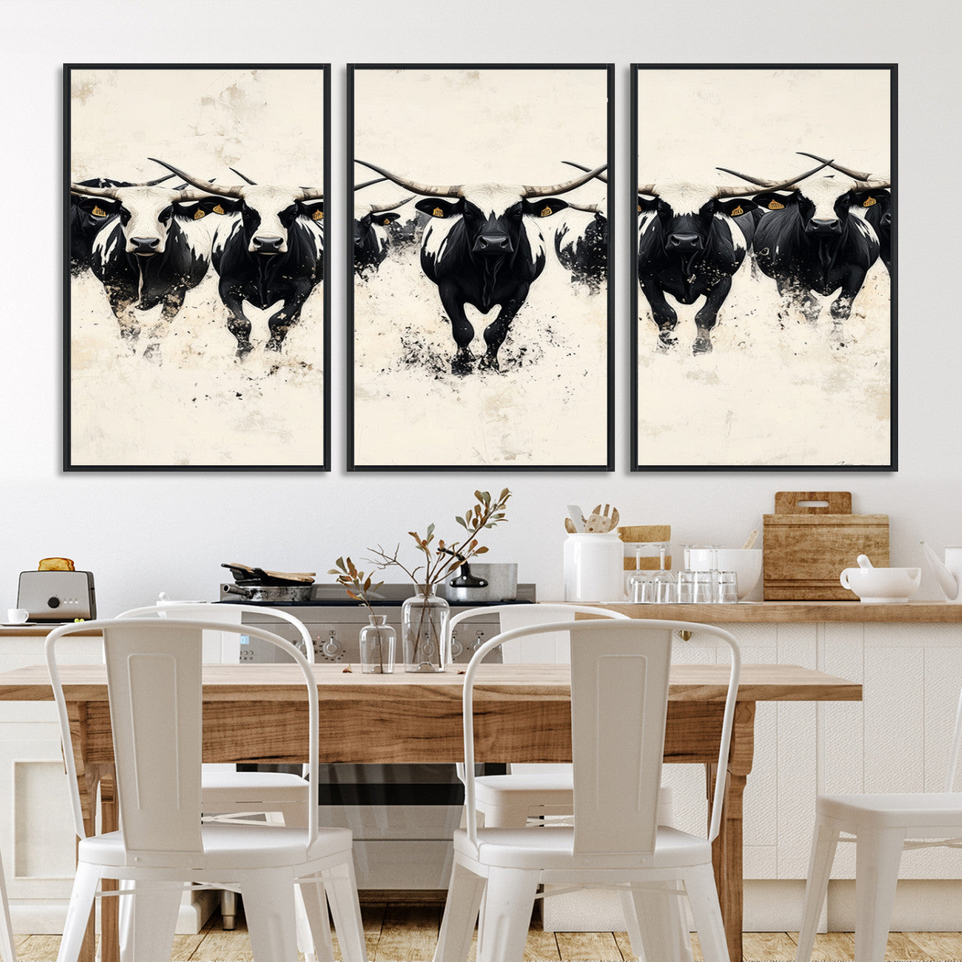 Canvas artwork of black and white Texas longhorns in a bold stampede over a minimalist background, ideal for rustic modern or Western-themed decor.