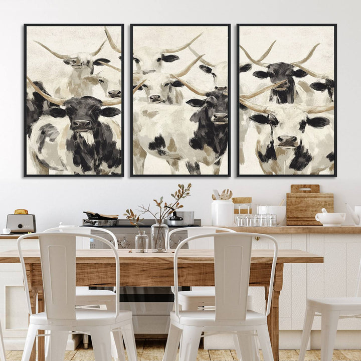 Canvas print titled Longhorn Texas Cow Drawing, depicting longhorn cattle with black and white markings, made in the USA, displayed on the wall.