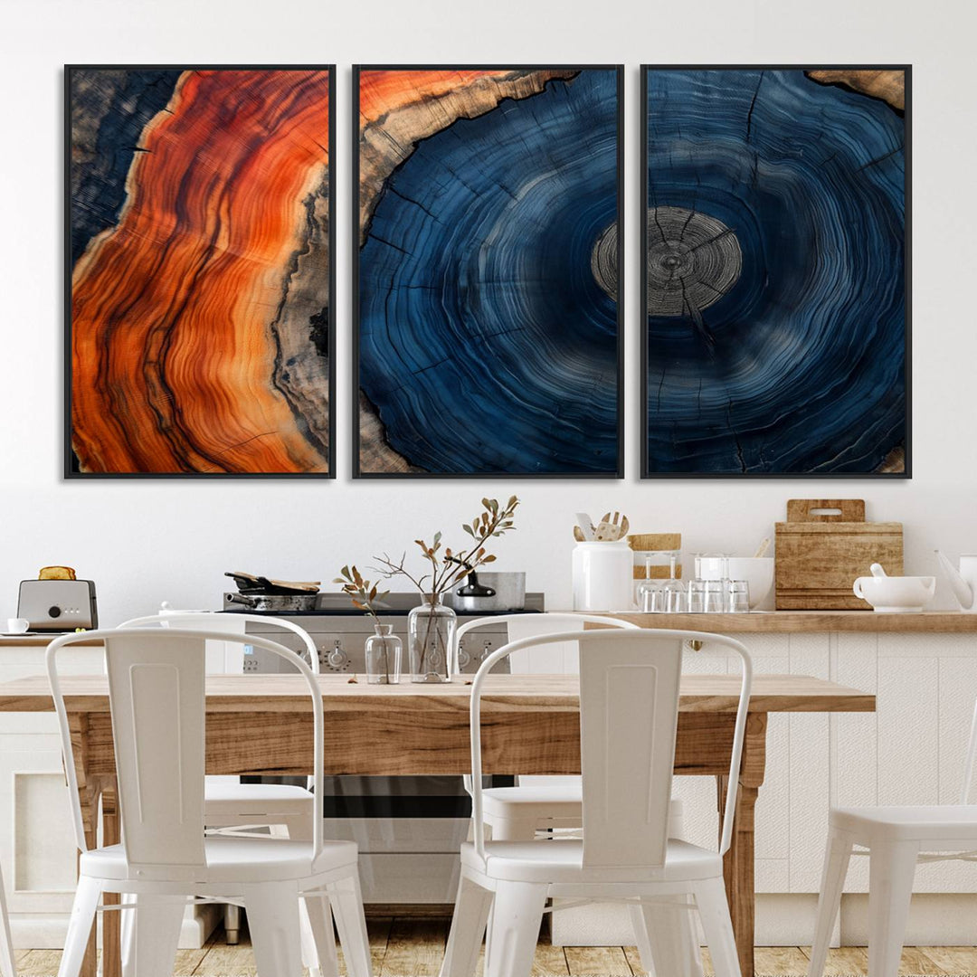 Abstract Tree Ring Wall Art Print on canvas featuring vibrant blue, orange, and brown rings with a natural rustic wood texture. Free shipping available!.