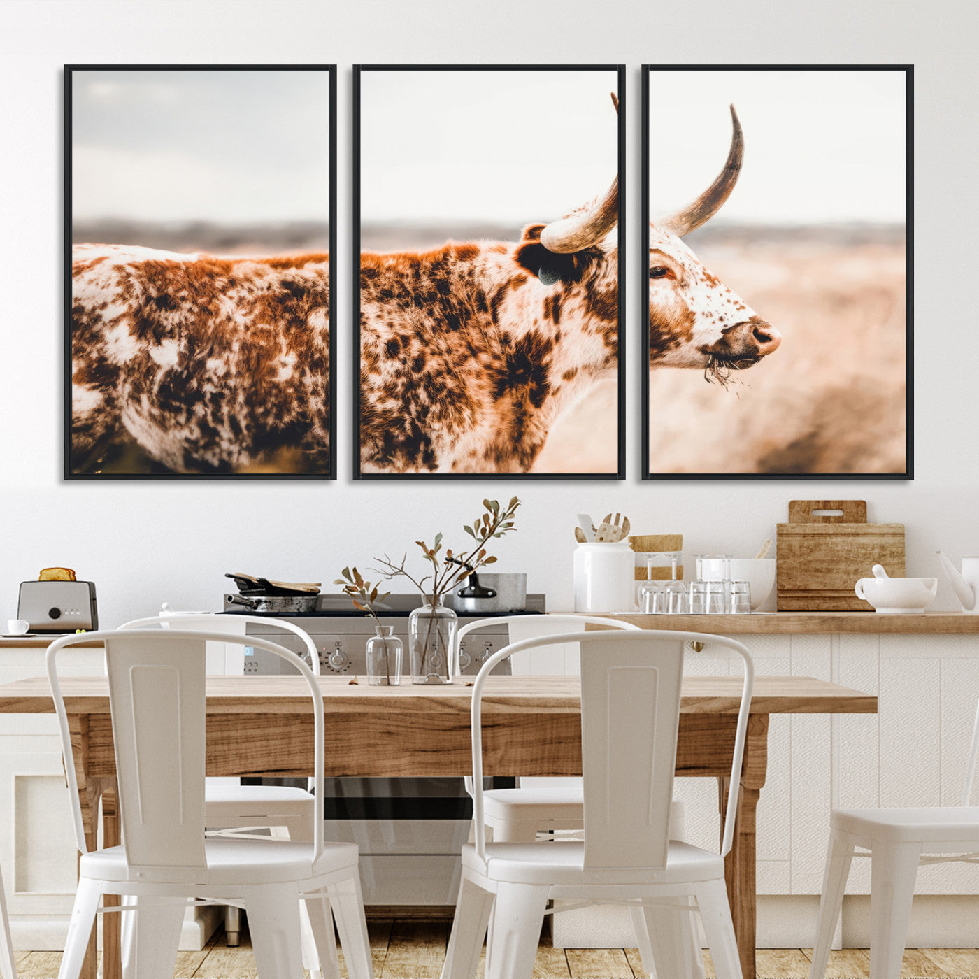 Speckled Texas longhorn with curved horns standing in a warm-toned prairie, perfect for rustic or country-style home decor.
