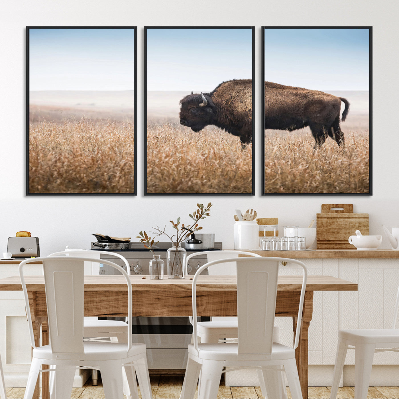 A solitary American bison stands in a dry grassland under soft skies, ideal for rustic or western-style home decor in warm neutral tones.