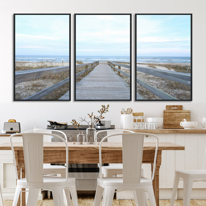 Wooden boardwalk leading to a peaceful beach with gentle ocean waves under a soft pastel sky, perfect for coastal and nautical home decor.