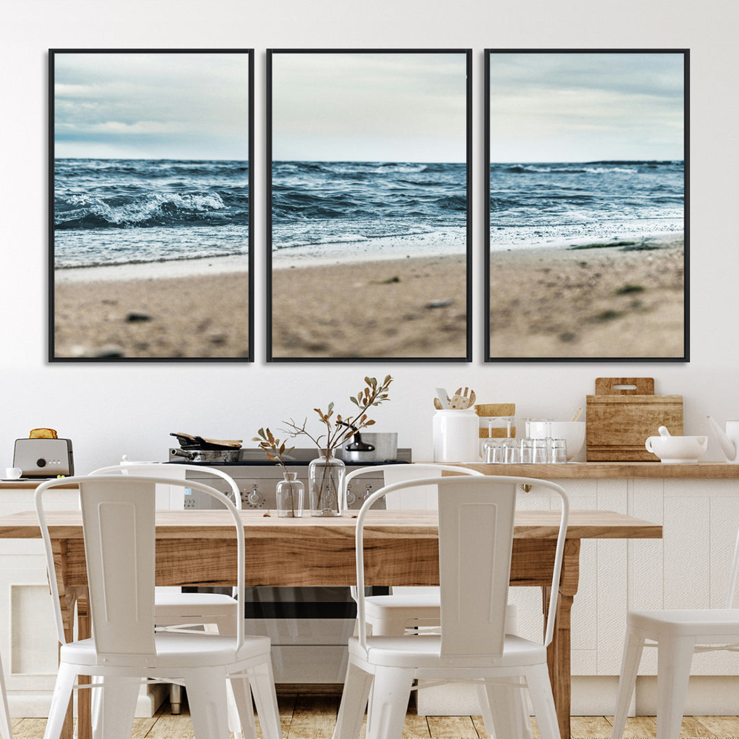 A moody ocean scene with gentle waves washing onto a sandy beach under a cloudy sky, creating a peaceful and coastal atmosphere.