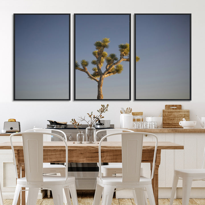 A lone Joshua Tree standing against a deep blue sky, capturing the serene and rugged beauty of the Southwestern desert landscape.