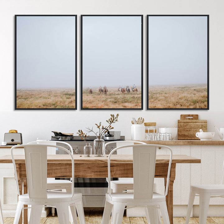 A group of horseback riders moving through a fog-shrouded field, evoking a calm Western scene with golden grasses and soft horizons.