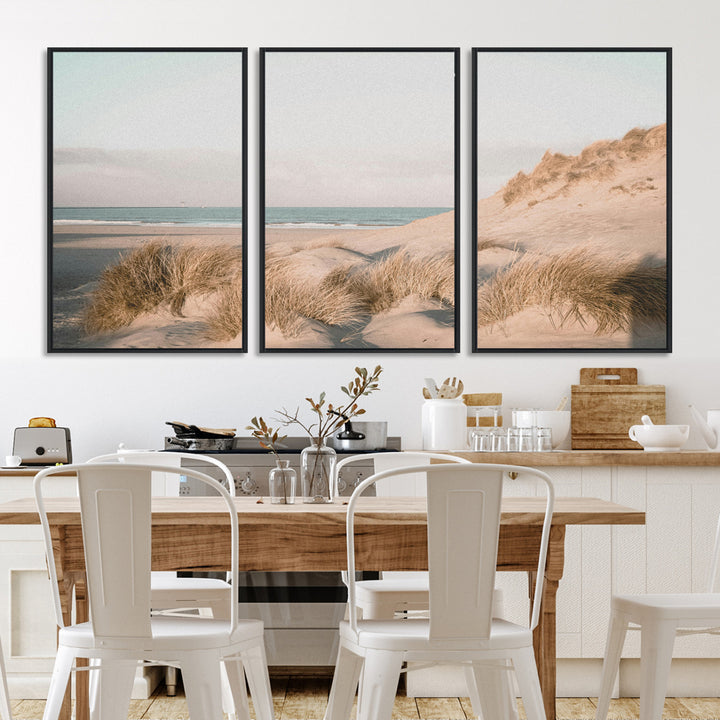 Soft pastel-toned beach scene with sand dunes, windswept grasses, and a calm ocean horizon, creating a serene coastal atmosphere.