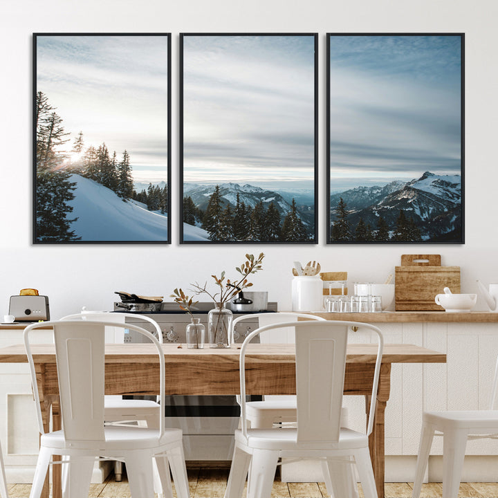 A breathtaking view of snow-covered mountains with evergreen trees and soft sunlight peeking through, creating a serene and peaceful winter scene.
