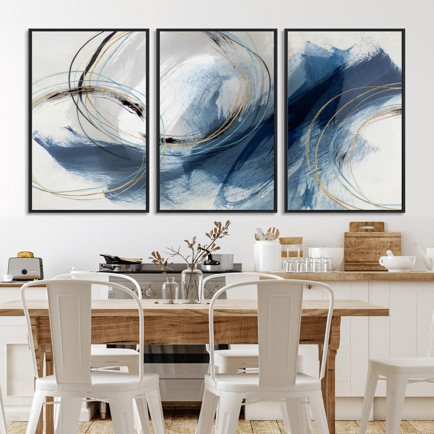 Abstract wall art featuring dynamic brush strokes in shades of blue and gray, overlaid with delicate circular line patterns in gold, black, and light blue on a white background.