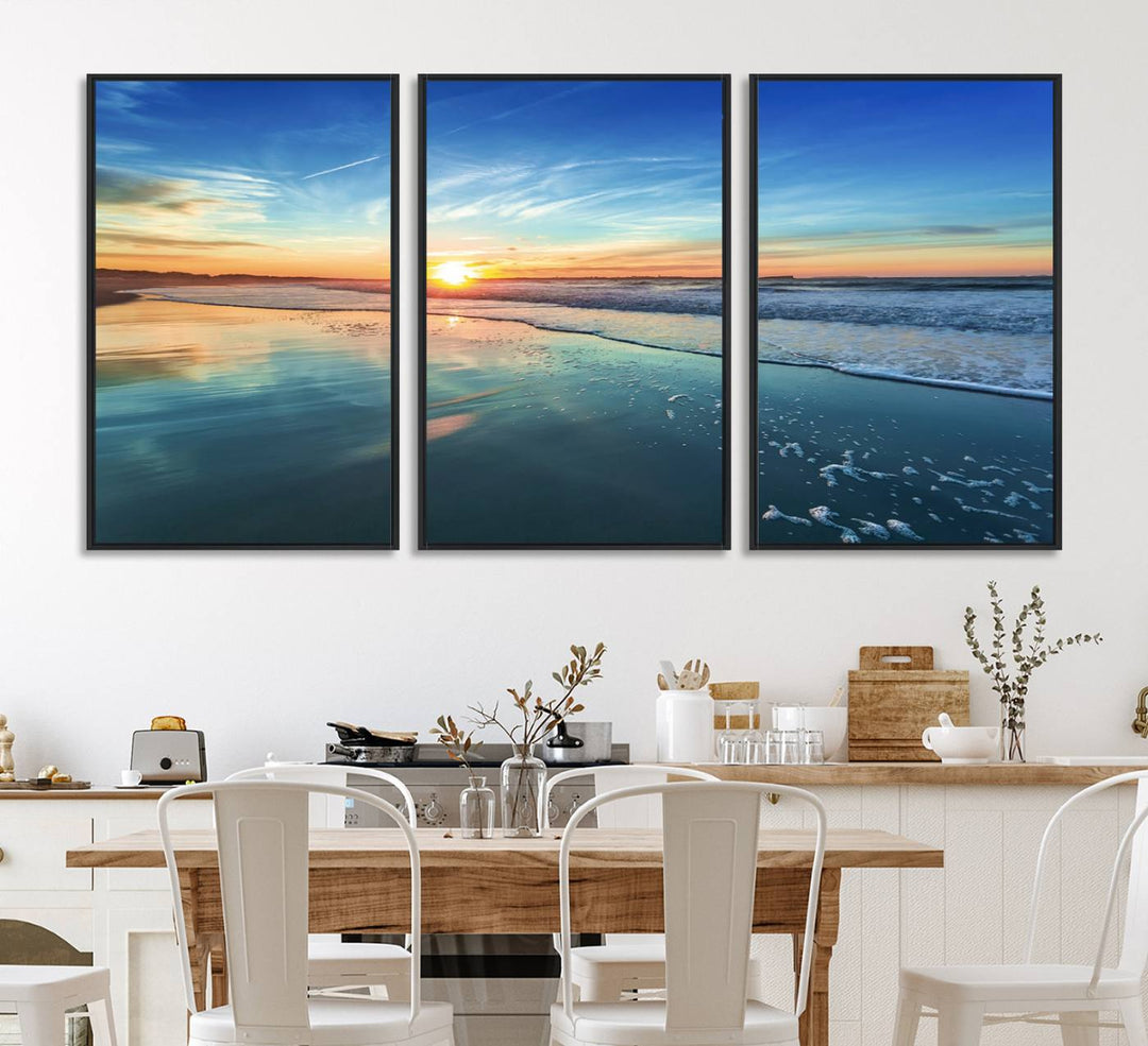 The Blue Sky and Beach Wall Art Canvas Print features a vibrant orange sky reflecting on wet sand.