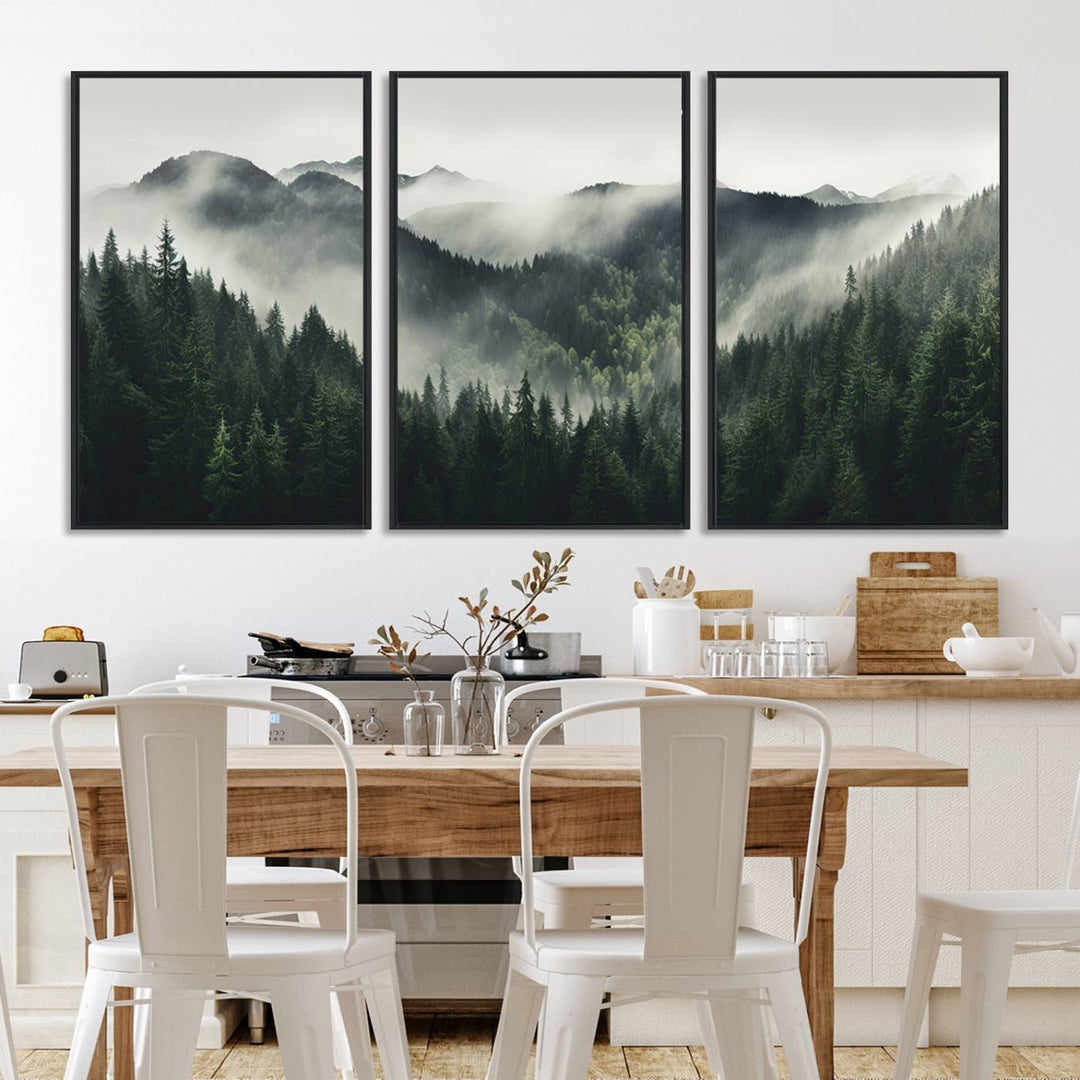 The Misty Forest Canvas Print Wall Art captures a serene misty forest scene with fog and mountains.