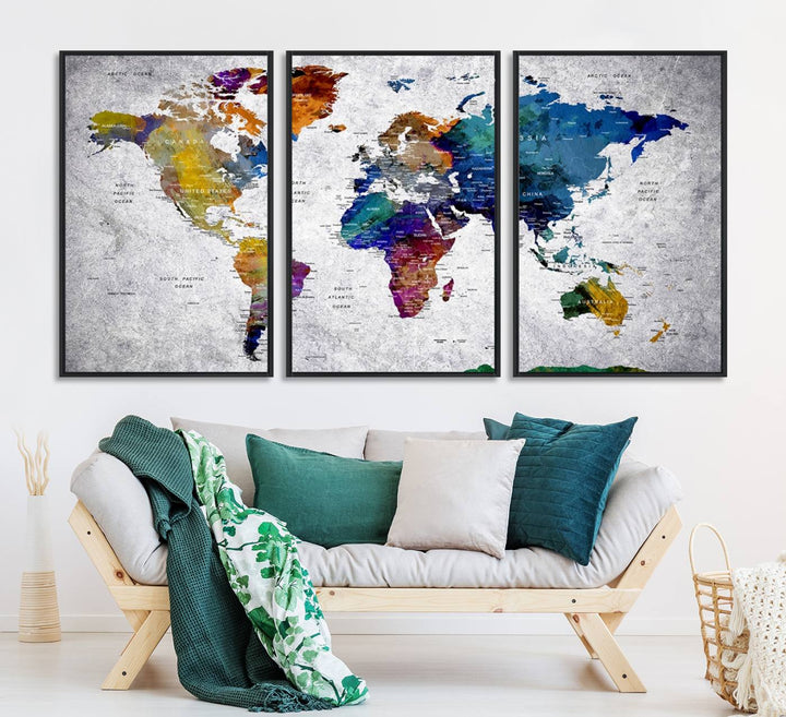 The World Map Art Canvas Print, featuring country names on a grunge-stained gray background, is perfect for stylish home decor.