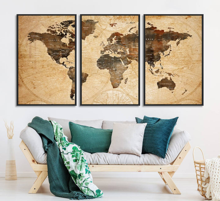 Vintage World Map: 3-Panel Canvas Print in antique rustic style. Framed and gallery wrapped. Ideal for decor.