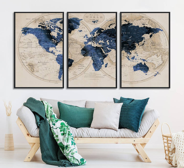 The Vintage Triptych Map Print is a grunge-stained blue and beige world map, perfect for enhancing wall decor.