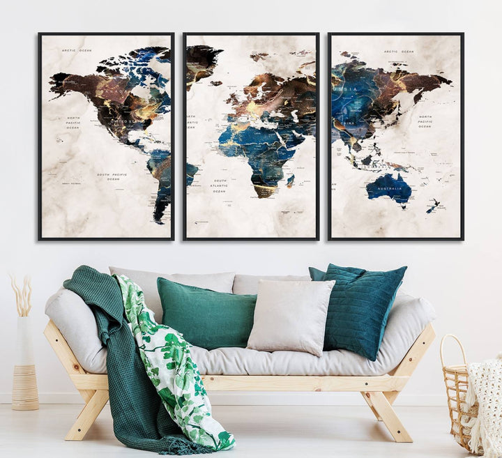 Abstract earth-toned 3-panel world map wall art featuring blues and browns, ready to hang; it showcases continents on modern canvas.