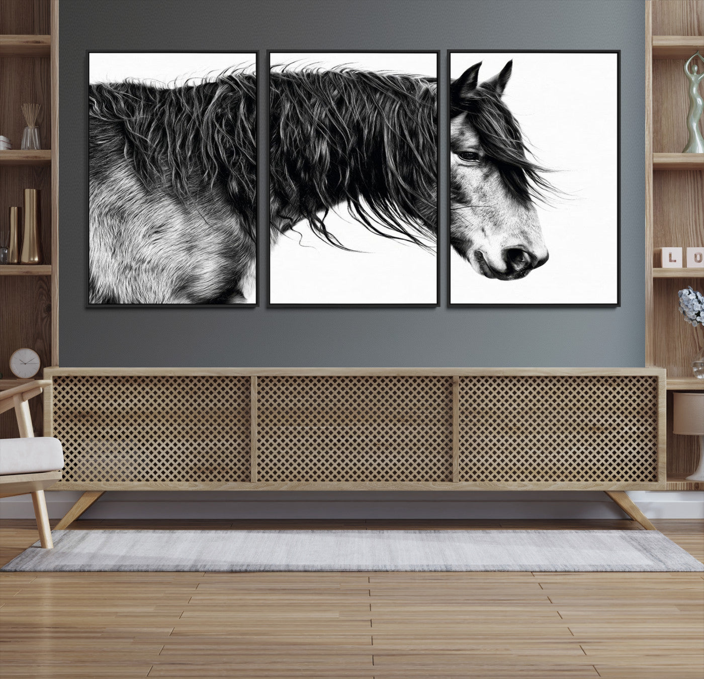 A stunning black-and-white portrait of a horse with a flowing mane, captured in dramatic detail and emotion.