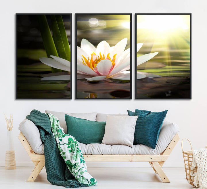 The Lotus Flower Wall Art Canvas Print showcases a white water lily with a yellow center floating gracefully in sunlight.