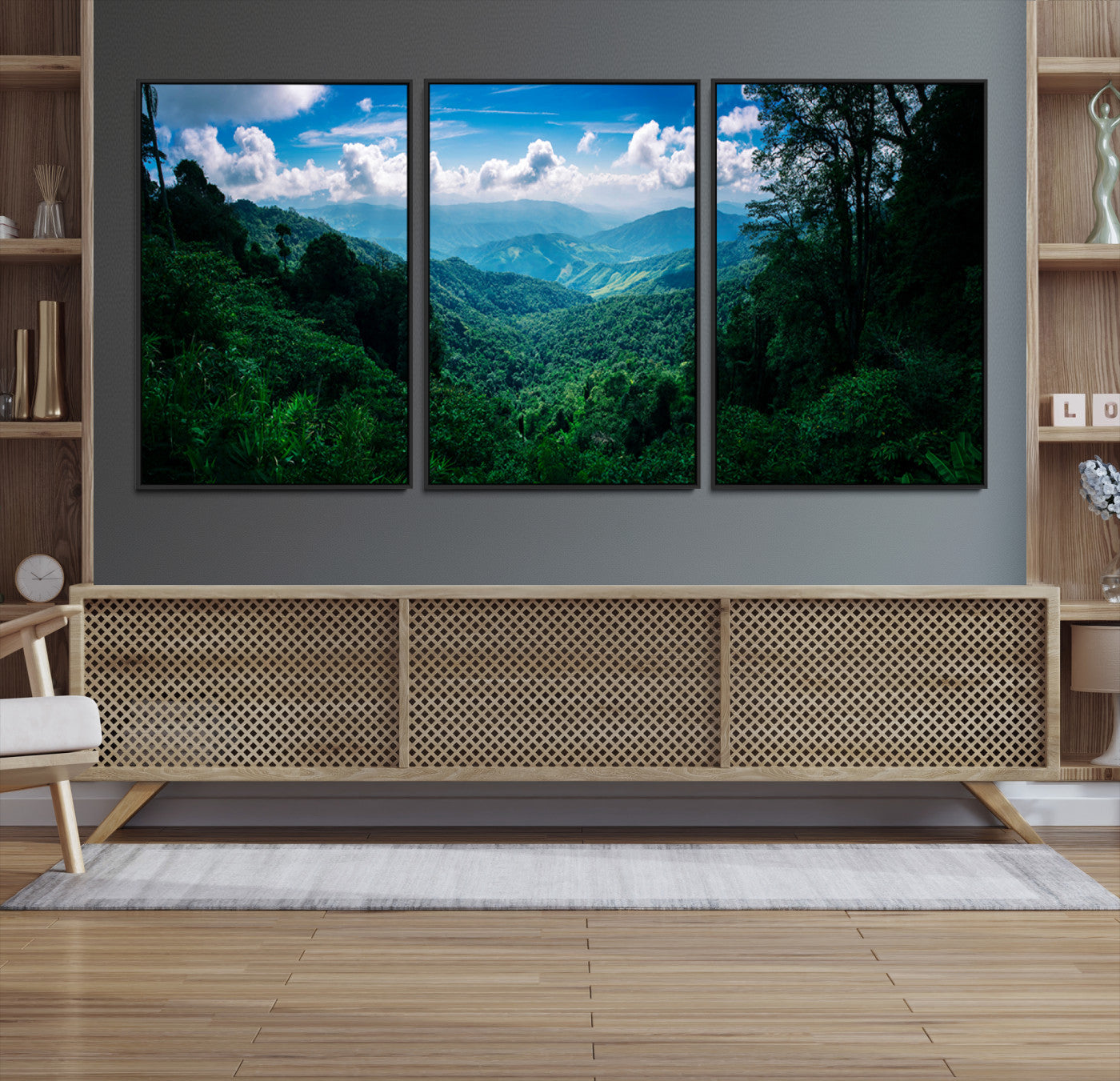 Canvas of a misty tropical jungle with vibrant greenery and layered blue mountains, ideal for exotic nature-themed wall décor.