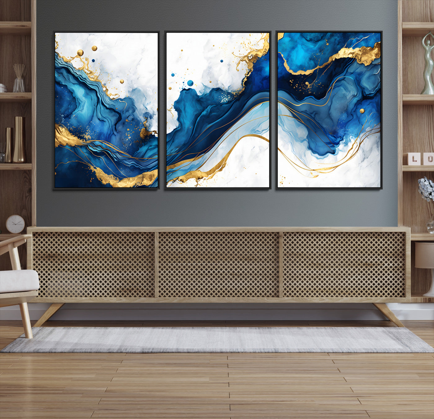 Elegant abstract canvas in cobalt blue and gold tones, featuring marble waves and fluid motion, ideal for luxe interior styling.