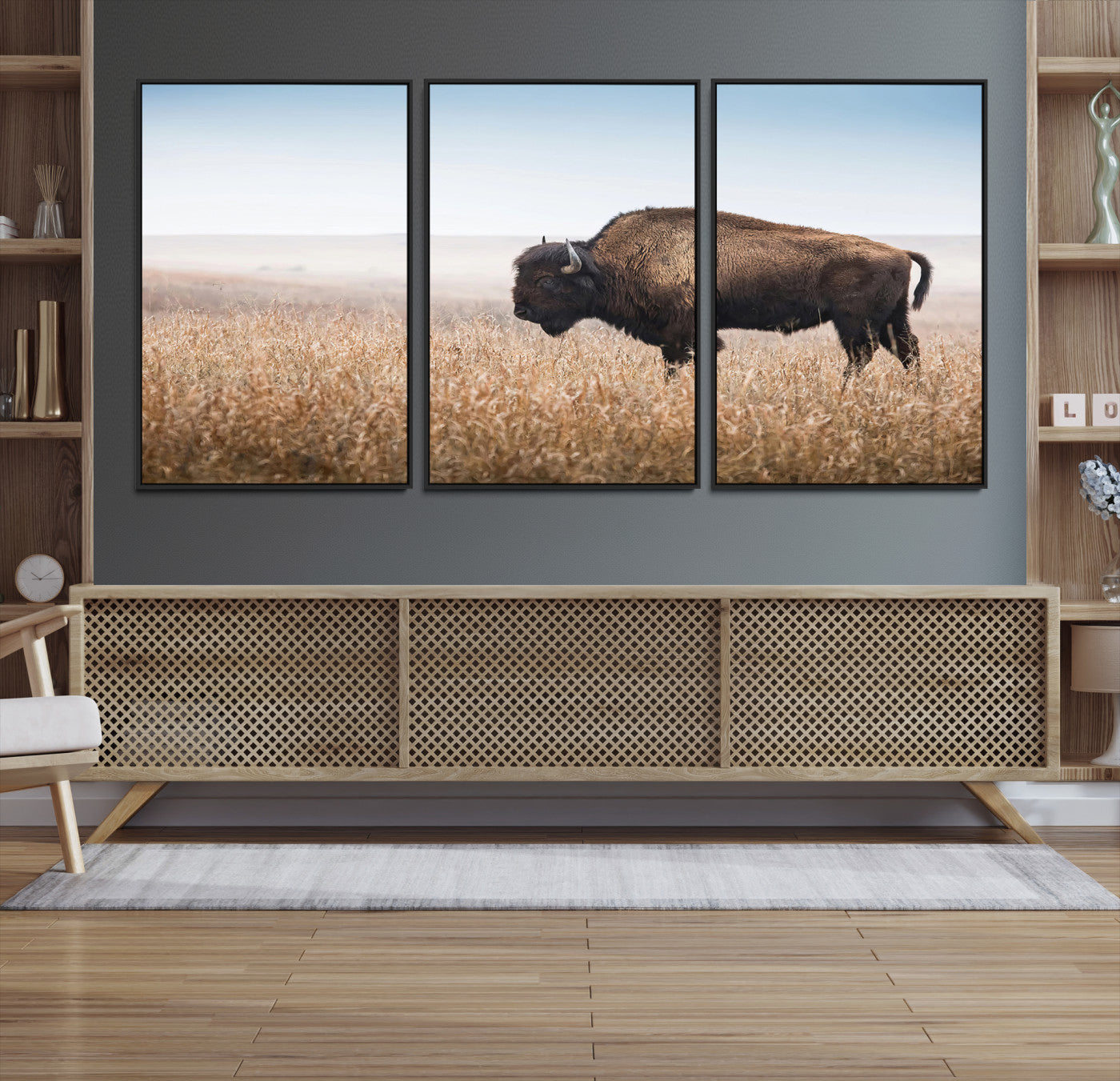 A solitary American bison stands in a dry grassland under soft skies, ideal for rustic or western-style home decor in warm neutral tones.